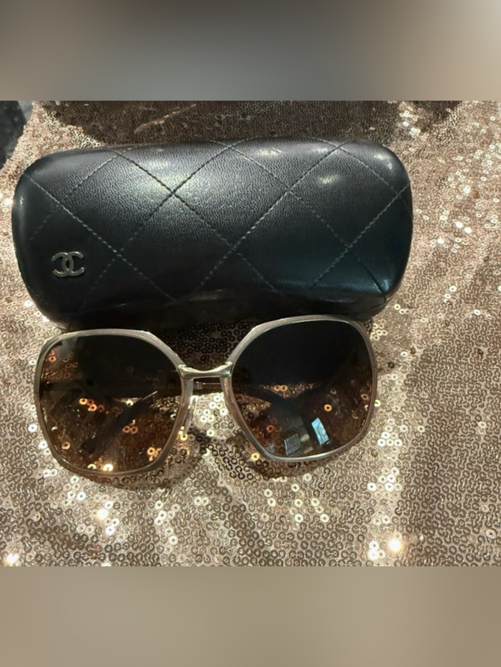 CHANEL Black Quilted Case with Gold-Tone Frame Sunglasses and Brown Lenses